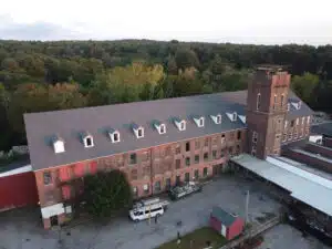 Second Wind for an Old Mill: Guaranteed Roofing Revamps Killingly Roof